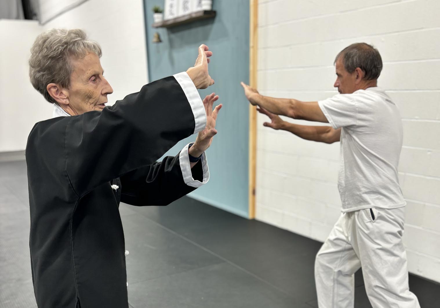 tai-chi-in-mississauga Two students practicing partner blocking drills at AMA Dojo Mississauga.